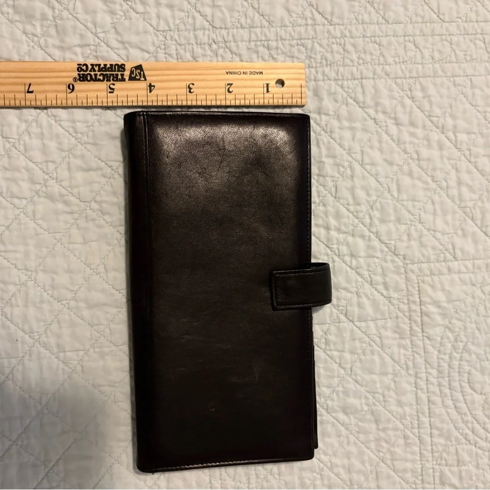 Tumi travel wallet passport card organizer.